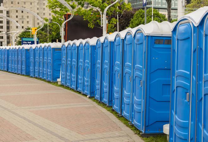 portable restrooms lined up at a marathon, ensuring runners can take a much-needed bathroom break in Chagrin Falls